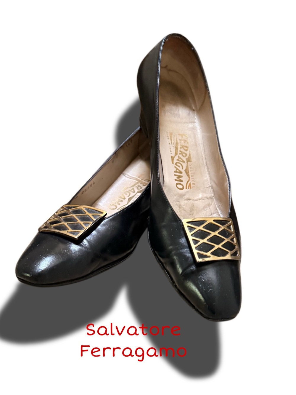 SALVATORE FERRAEGAMO
 Black Leather Pump with Gold Accent